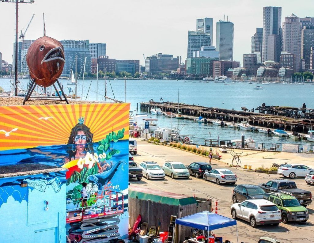 view of Artists for Oceans mural and downtown Boston