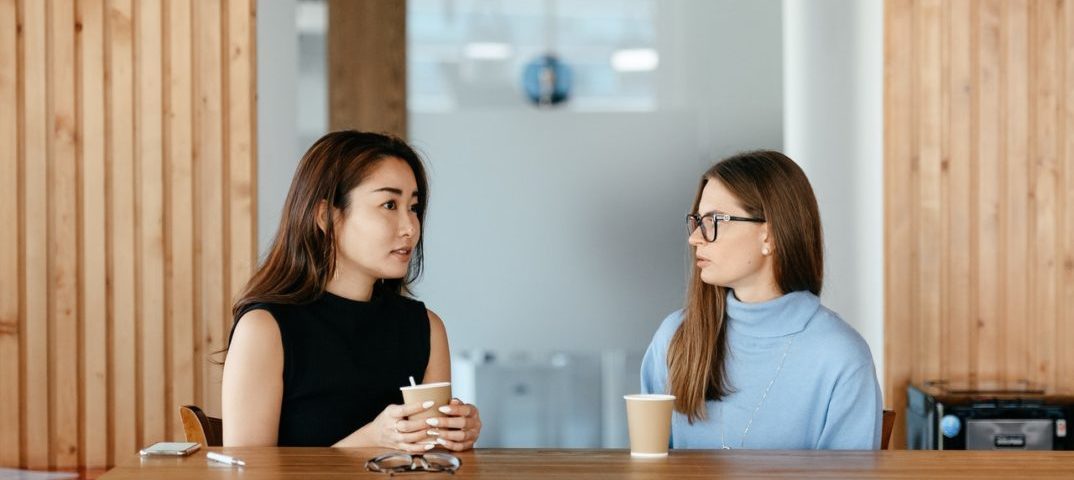 Two family board members talking