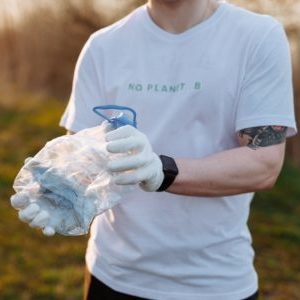 Resident volunteer clean-up trash outdoors